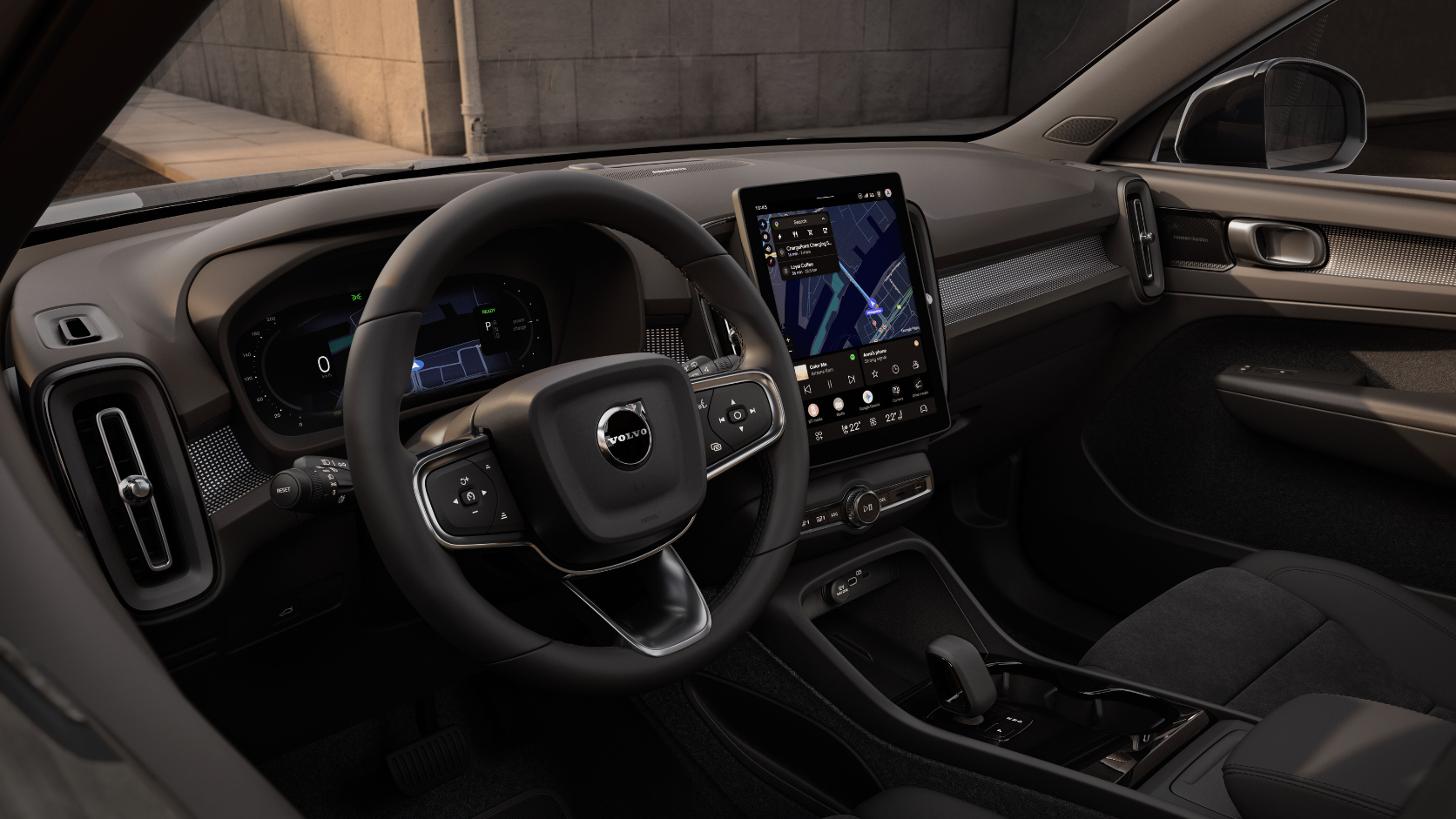 Interior do Volvo XC40 2028 exibindo a nova central multimídia flutuante com integração ao Google Gemini.